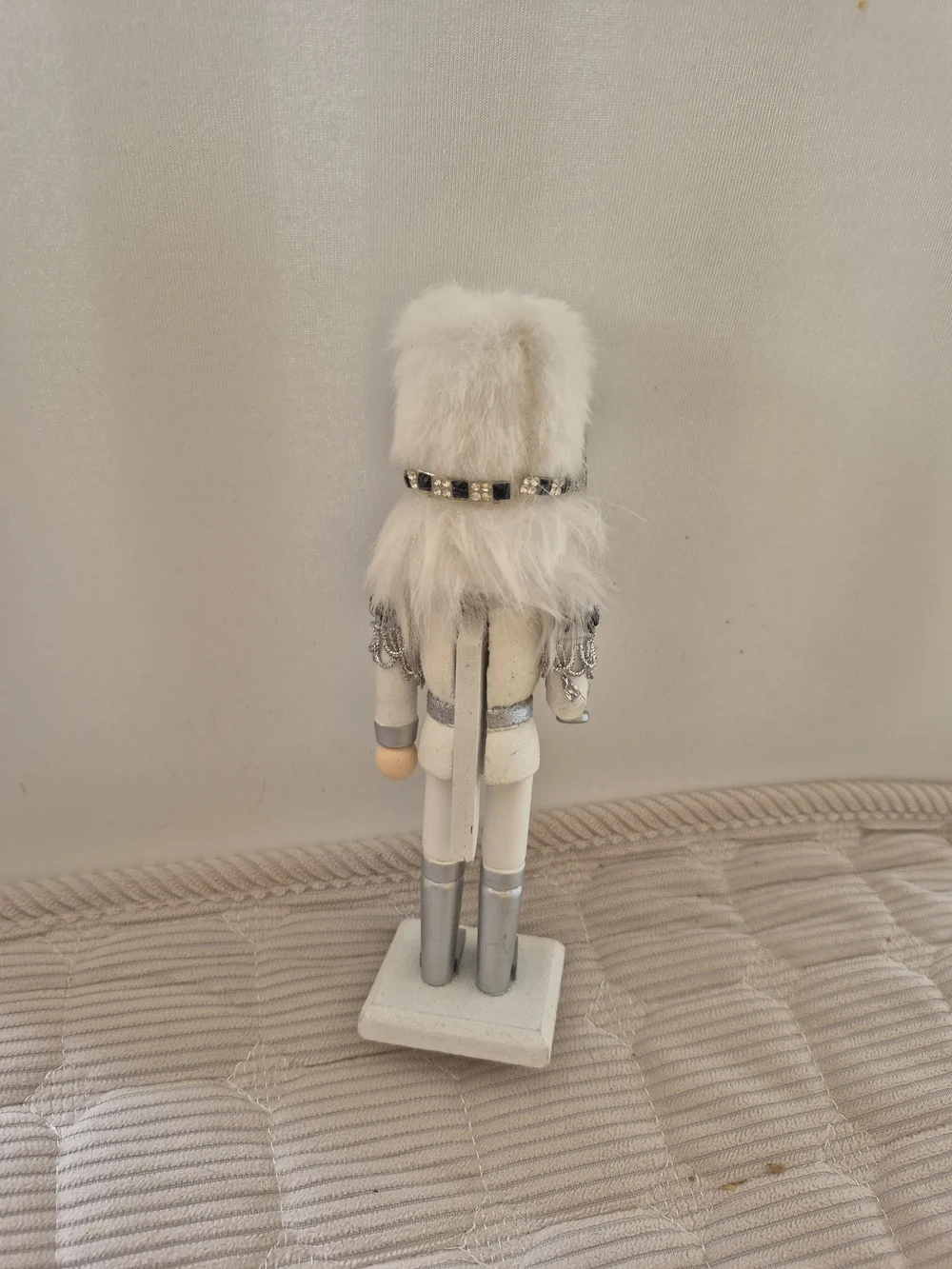 White and Silver Nutcracker Figurine with Faux Fur Hat